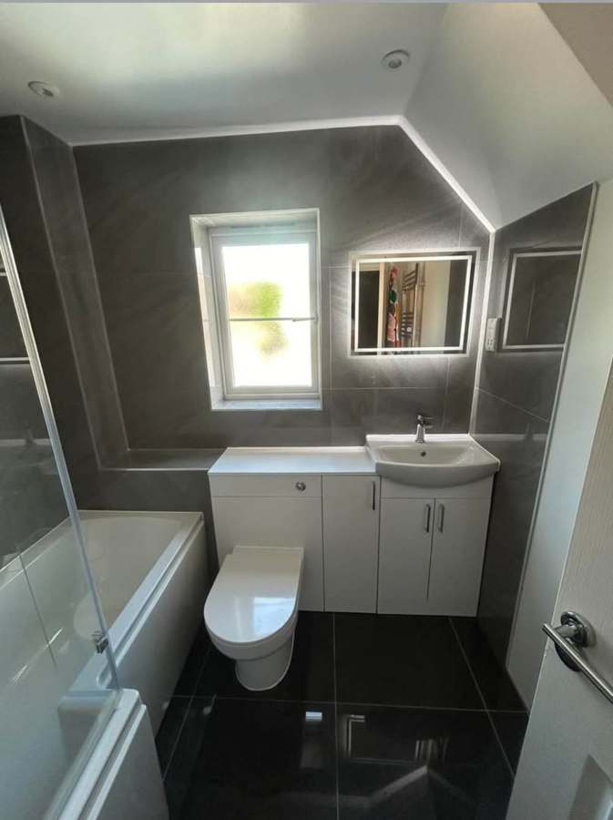 After — Dated suite out — grey & gloss in