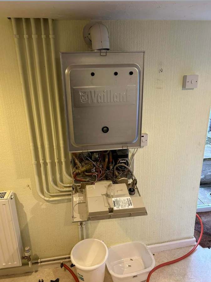 Before — Old boiler out — new Vaillant in & commissioned