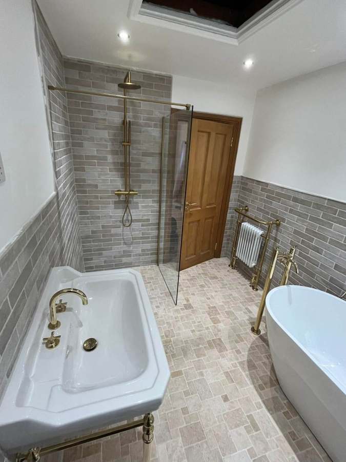 Brass & freestanding bath — period feel, new plumbing